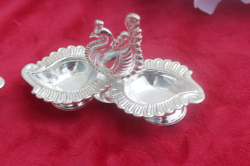 peacock with 2 side diya, german silver return gifts, wedding favors, pooja gifts, haladi kumkum gift, golu pooja favors, varalakshmi gifts