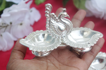 peacock with 2 side diya, german silver return gifts, wedding favors, pooja gifts, haladi kumkum gift, golu pooja favors, varalakshmi gifts